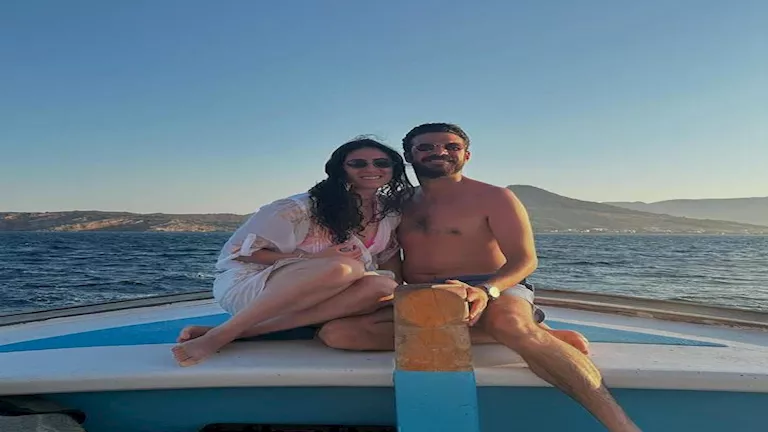 15 صورة لـ نور الشربيني مع زوجها في المصيف على شاطيء البحر